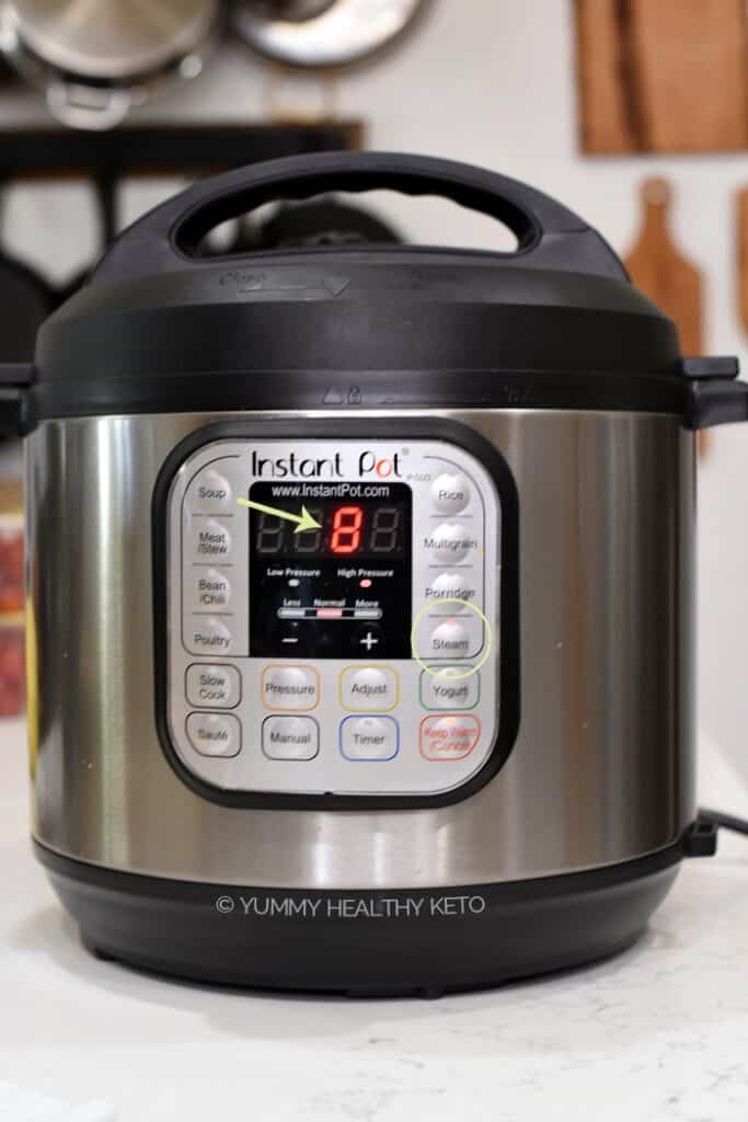An Instant Pot set for 8 minutes on high pressure using the steam function.